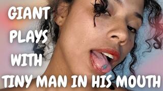 GIANT PLAYS WITH TINY MAN IN HIS MOUTH