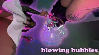 The giantesses blow bubbles for a happy new year