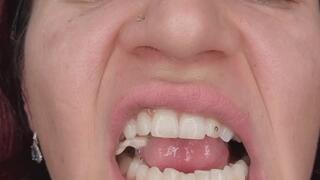 I chew gum, showing my whole mouth.