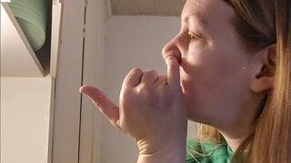 Nose picking booger eating in the kitchen while doing dishes. Blowing nose and snot