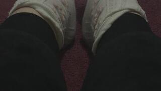 STAGE HAS FUZZ BALLS ON HER COTTON SOCKS