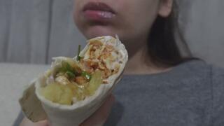 My Indian girlfriend eats a wrap because she likes to eat a lot and this is a big wrap, it's also high in calories, which she loves because she loves to eat.