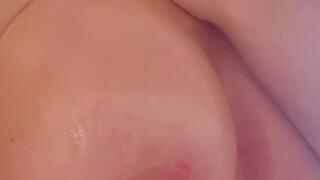 Just me and a bottle of oil… taking my time and moisturising my tits and nipples