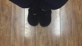 SLIPPERS ON BLONDE HARDWOOD