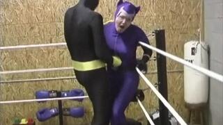 Bound And Beaten Yellow Bats Belly Beating On Cat Woman