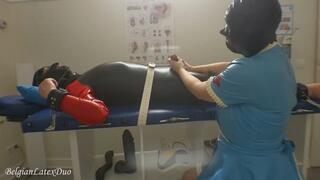 Rubber Patient Pleasure: Latex Slave Handjob on the Exam Table