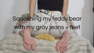 Squashing my teddy bear with my gray jeans + feet