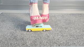 Ground View Abby crushes a 70s Chevrolet Impala in Pink chunky platform high heels