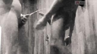 A boy is discussing with his horny stepdad in the pool's public showers when daddy suddenly pees on him