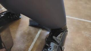 Crossdresser in black stockings and patent leather cheongsam