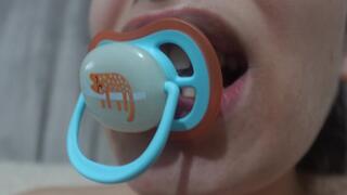 Pacifier My stepsister masturbates, then puts her pacifier on her big breasts, smears a lot of saliva on it, then sucks her pacifier again