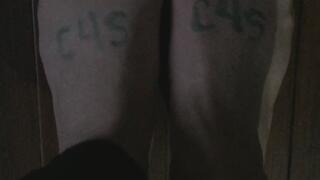 STINKY FEET ON A CHESTNUT WOODEN FLOOR