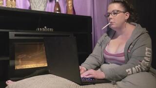 Sitting in front of the fireplace smoking a VS menthol 100 and working on my laptop