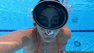 Carissa in her new bikini in the resort pool with face mask fill and clear
