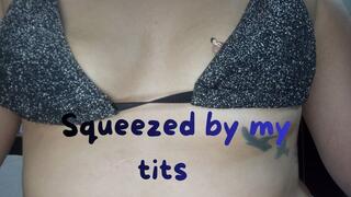 Crushed by saggy breasts