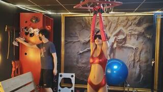 Extreme tiptoeing training and wooden cage suspension restraint