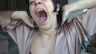 yawn on a chair by the window m