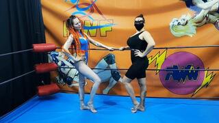Strong fem wrestler vs skinny fem wrestler in a leotard