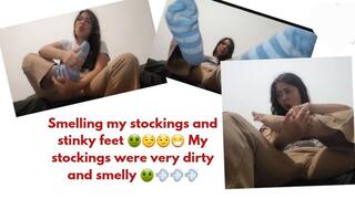 Smelling my stockings and stinky feet. My stockings were very dirty and smelly