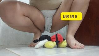 Lola pees on little Teddy