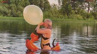 Hot inflatable puppy fucking and simultaneous B2P with a green balloon on a lake