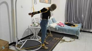 The girl in the short boots has her hand straight out and tied behind her back, with her mouth covered (Chinese Model)