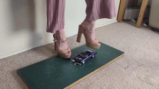 Giantess Lily Kink toy car crush of a 1965 Chevrolet Impala in big chunky heels left view