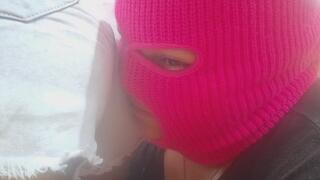 a masked woman smelling a stranger's fart