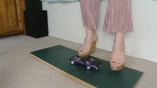 Giantess Lily Kink toy car crush of a 1965 Chevrolet Impala in big chunky heels right low view