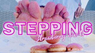 Stepping strawberry donuts with bare foot