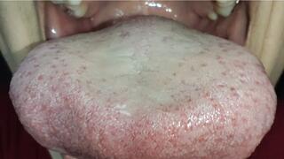 Large, dirty Asian tongue in close-up.