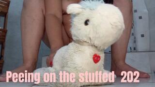 Peeing on the stuffed 202