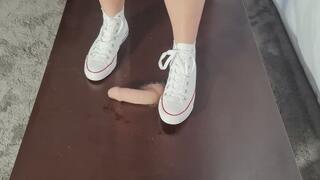 Breaking in my new Converse on my slaves condomed Cock