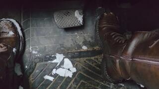 Traffic driving in tall boots