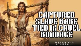 Sexy slave girl taken and tied to wooden bondage frame so you can watch her struggle in painful BDSM fantasy copy
