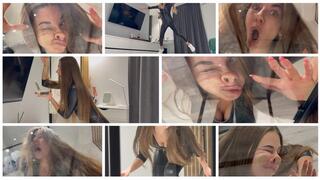 Nastya got caught in a trap and is stuck to the glass face-first. Her face is flattened and sliding down the glass (custom video)