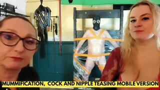 A SUB MUMMIFIED ON A PILLORY IS GETTING EXCITED BY COCK AND NIPPLES TEASING ENGLISH MOBILE VERSION