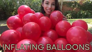Inflating + 40 red balloons