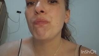 Chewing gum and blowing bubbles in front of the camera