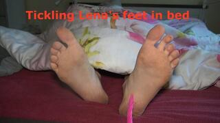 Tickling Lena feet in bed