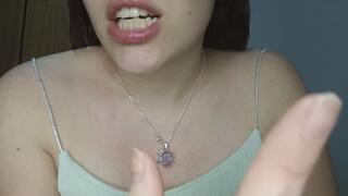 Biting my fingers, I show you my hands and teeth