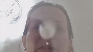 I cough and spit directly on the lens.