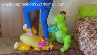 Nastya tramples two large inflatable dinosaurs with her bare feet, destroying them. Foot fetish and crush fetish. Feet Young