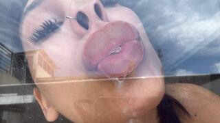 Wet kisses on the glass