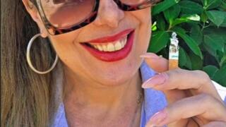 Smoking outdoors with a crush at the end - Newport Menthol
