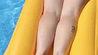 Sexy Summer Float Relaxation – Colorful Bikini Tease on Yellow Inflatable (Non-Nude)