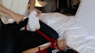 A cute twin-tailed JK girl was tied to the bed and had her white-stockinged feet tickled with props.