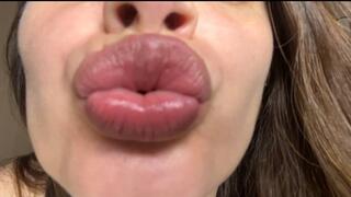 Plump Lips Blowing Kisses Close Up