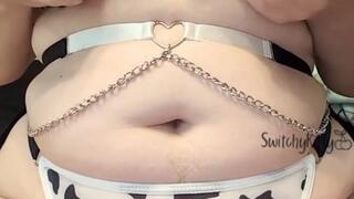 Horny Hucow plays with big tits, stimulates nipples and masturbates with a vibrator until squirting