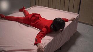 xr75-The girl's hands were tied to the bed.